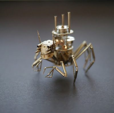 Insecto robot con patas y tentáculos 