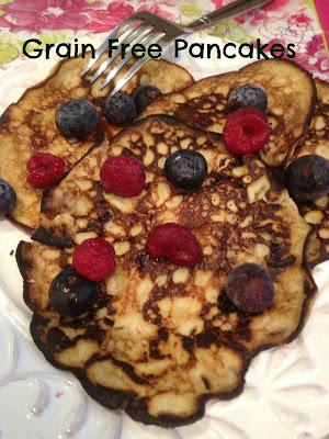 3 thin pancakes topped with blueberries and raspberries