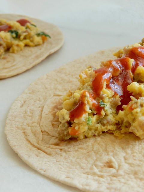 Loaded Healthy Freezer-Friendly Breakfast Burritos...using #IowaEggs! A great, prep-ahead breakfast for kids and adults on busy mornings. Eat fresh or keep in the freezer for up to 2 months.  Eat a healthier loaded breakfast with eggs! (sweetandsavoryfood.com)
