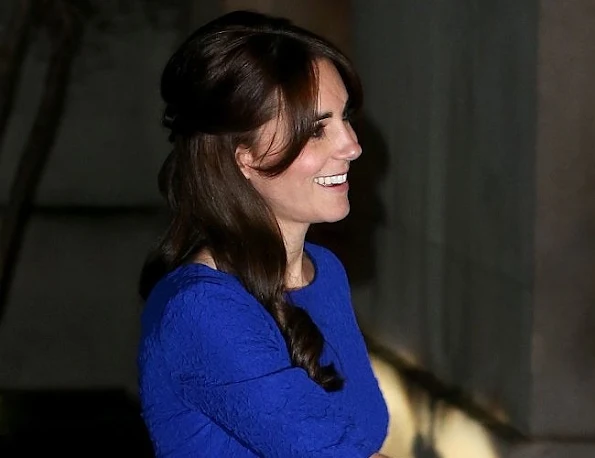 Kate Middleton wore Indian designer Saloni. The Martine Crinkle-Effect Dress is crafted from lightweight fabric in cobalt blue