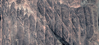 Mirage in the desert with fossilized bread bars arranged as cracks in the rock, in the mountains, abstract landscapes of deserts of Africa from the air, collection Naturalism Abstract: of Munimara abstract landscapes of deserts of Africa from the air, Mirage in the desert with fossilized bread bars arranged as cracks in the rock, in the mountains,