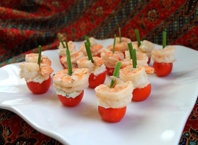 Food Lust People Love: Feta-Stuffed Cherry Tomatoes with Shrimp are exactly what they sound like: Cherry tomatoes filled with seasoned feta and topped with shrimp make one of the prettiest, easiest appetizers you can serve. Food Lust People Love: Feta-Stuffed Cherry Tomatoes with Shrimp are exactly what they sound like: Cherry tomatoes filled with seasoned feta and topped with shrimp make one of the prettiest, easiest appetizers you can serve.