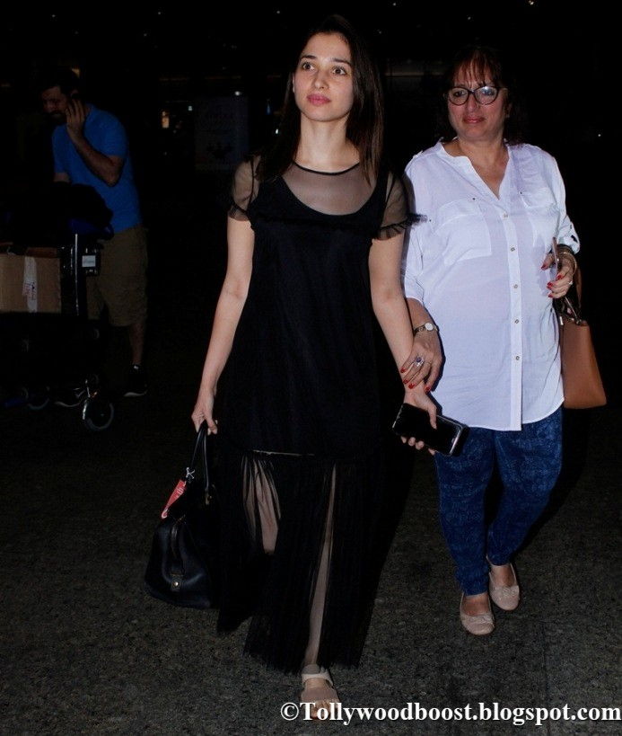 Tamanna Without Makeup Face In Black Dress At Mumbai Airport