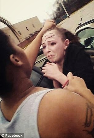 00 Moment girl gang beat up man's girlfriend, shaved her head and wrote 'I got my a*** whooped' on her face