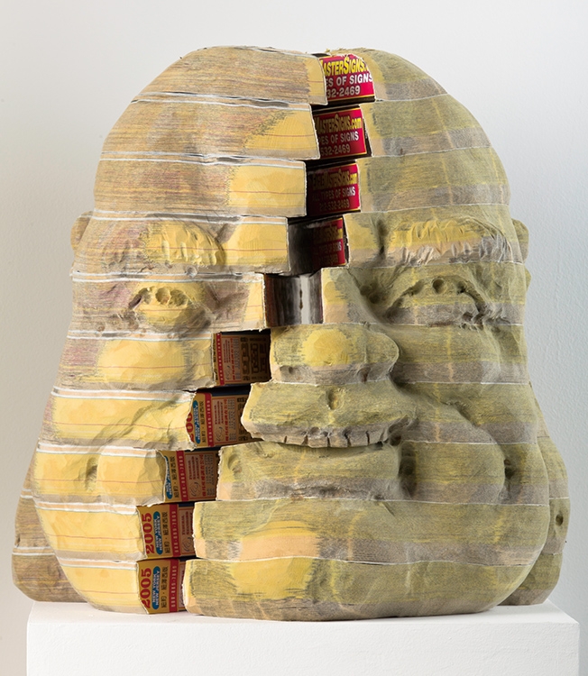 14-One-Buddha-Two-Systems-Long-Bin-Chen-A-Second-Life-for-Recycled-Book-Sculpting-www-designstack-co
