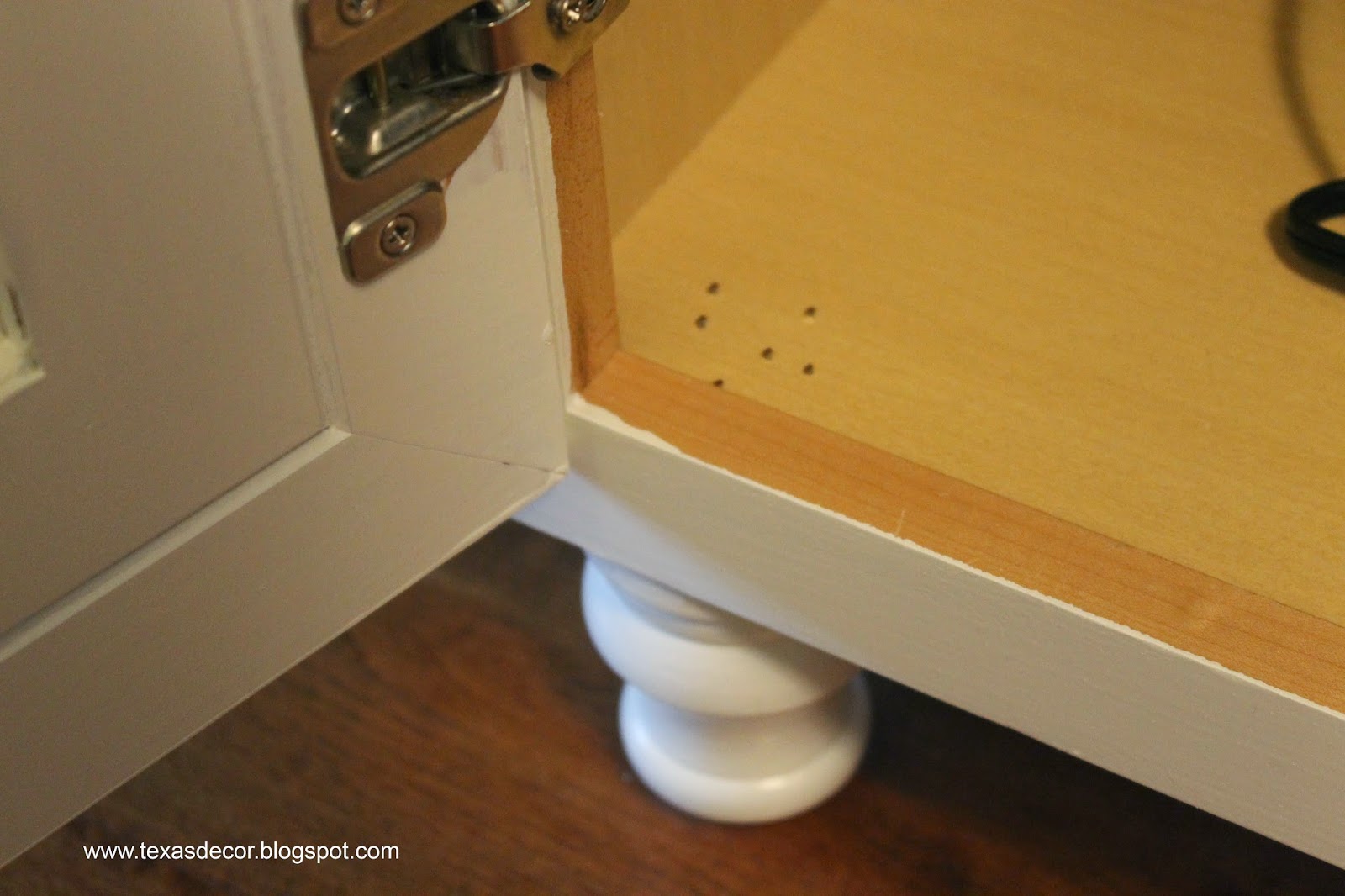 adding furniture legs to kitchen cabinets tutorial
