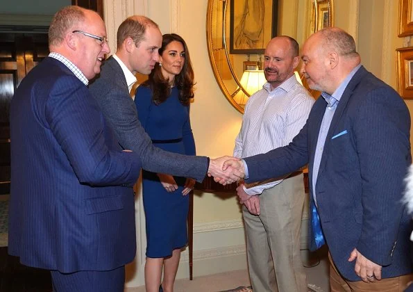 Kate Middleton wore Mulberry blue Ashleigh cape coat and a new Jenny Packham dress.The Duchess is wearing a cape coat by Mulberry