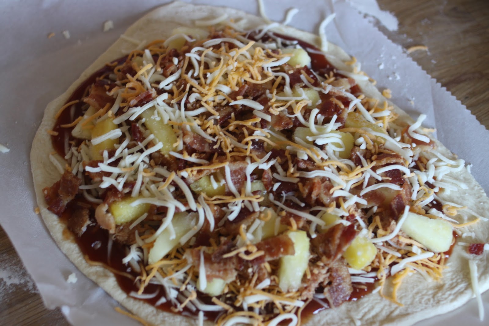 The Larson Lingo Pineapple Chicken Luau & Bacon Pizza