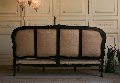 Vintage Settee Handsome and chic vintage settee with cotton canvas cushion and burlap upholstery. The Louis XV shape adds a lovely feminine hint to the black carved frame.  39H x 73W x 30D Seat Height: 18 Arm Height: 23 as seen on l&l