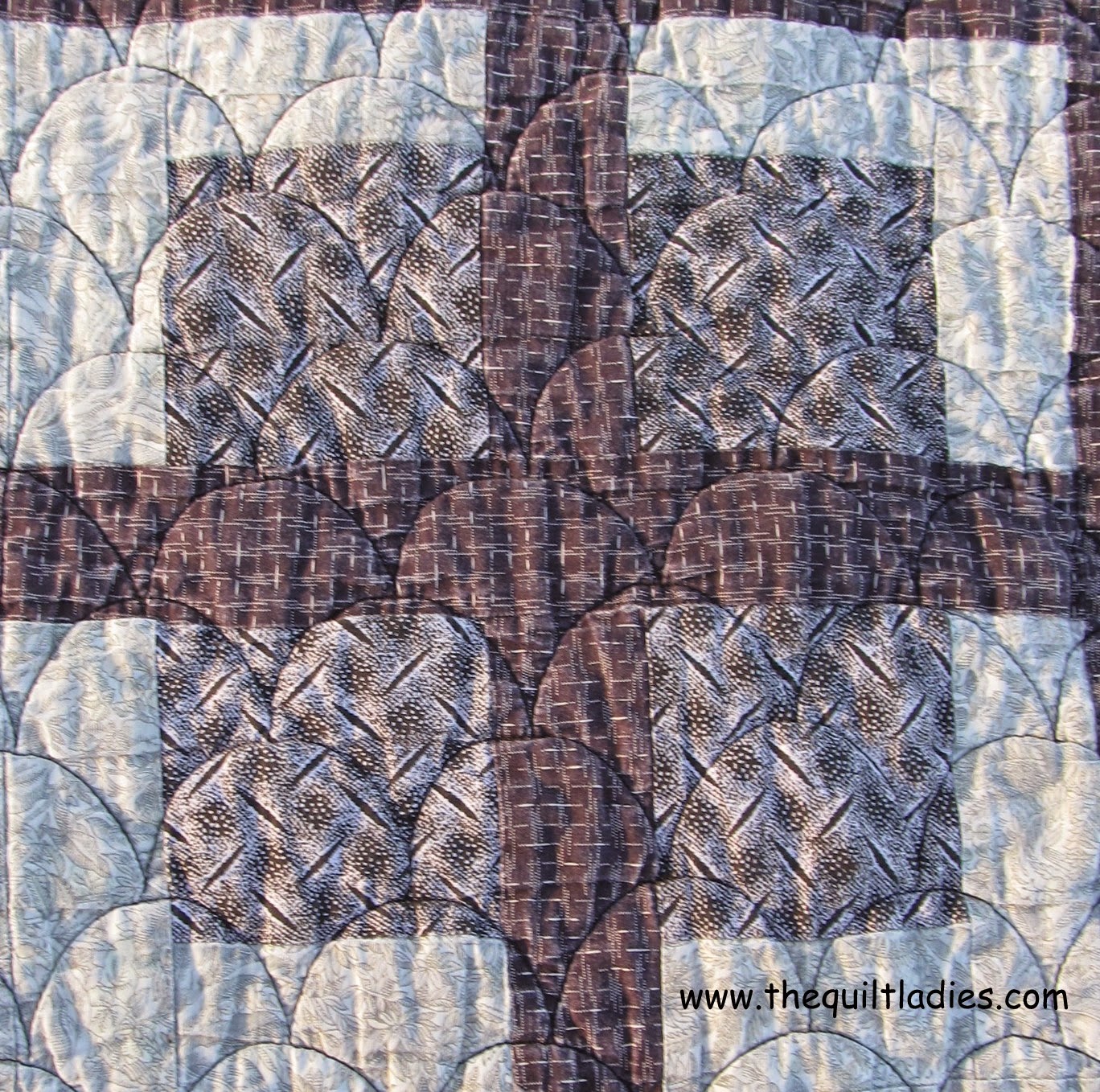 free quilt pattern for a purple quilt block