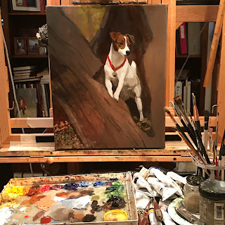 Jack Russell dog in old hollow tree