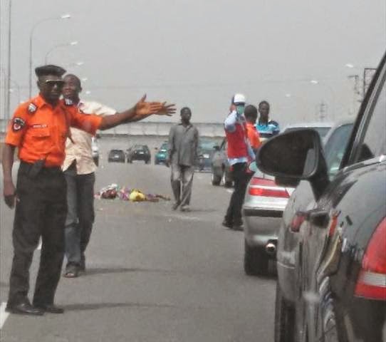 woman crushed death abuja