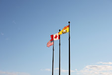 3 flags awaving.