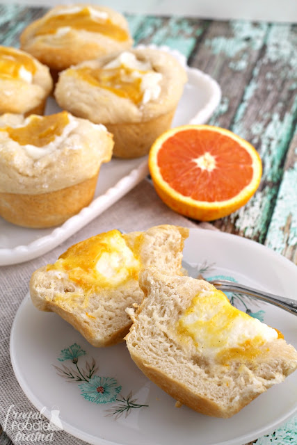 These easy to make, 4 ingredient Orange Creamsicle Danish Muffins can be on your breakfast table in less than 30 minutes.