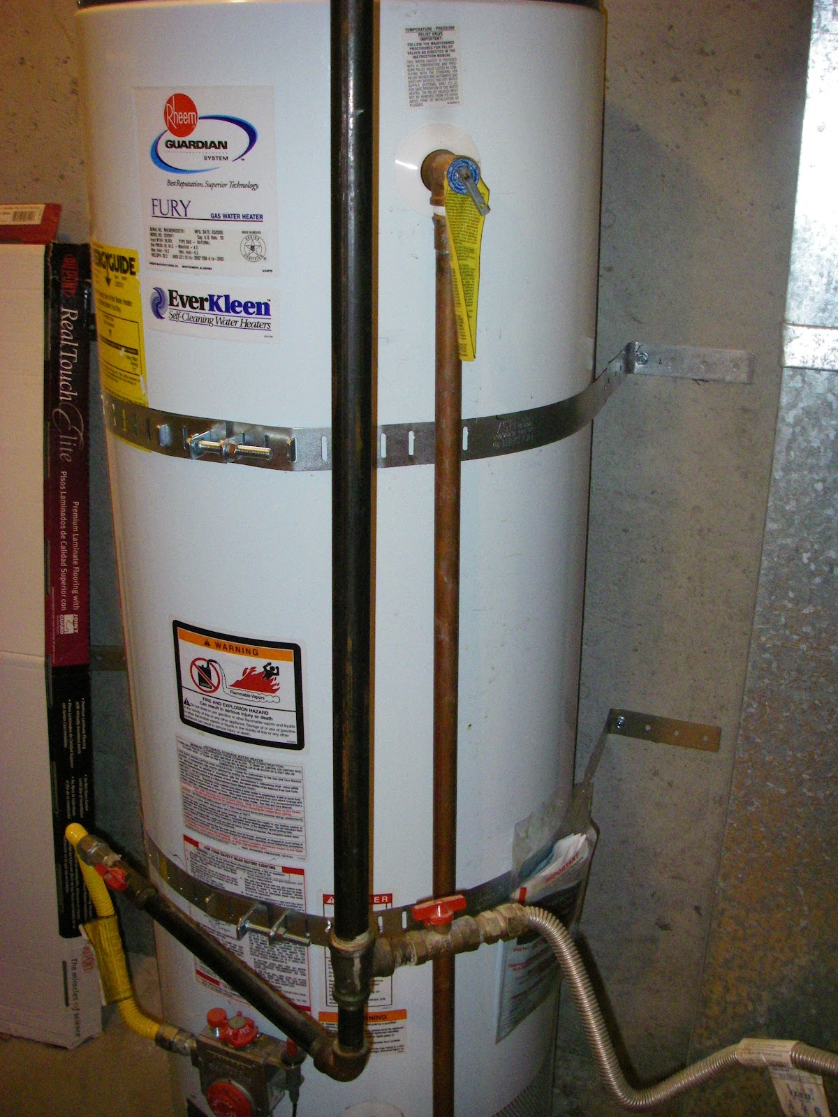 What one woman can do, another can do! Earthquake straps for water heater