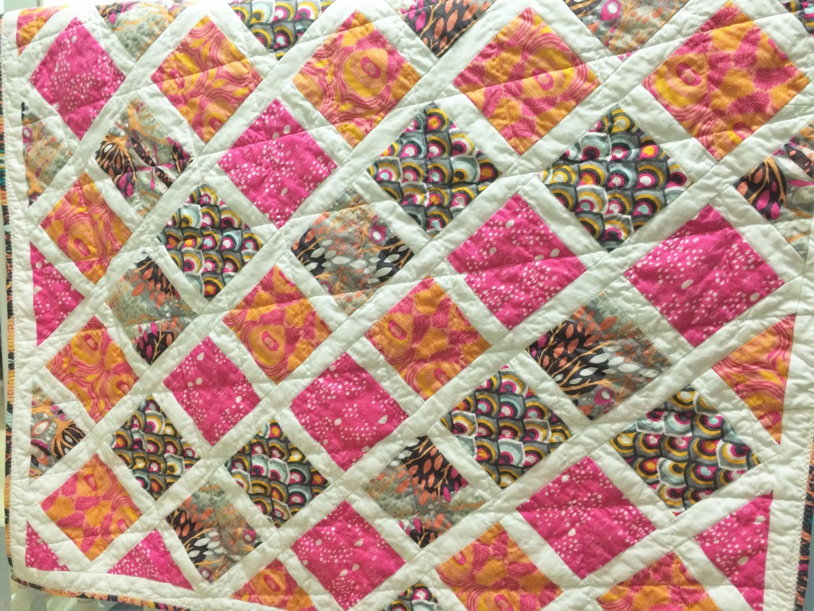 fluffy-puppy-quilt-works-on-point-squares-baby-quilt