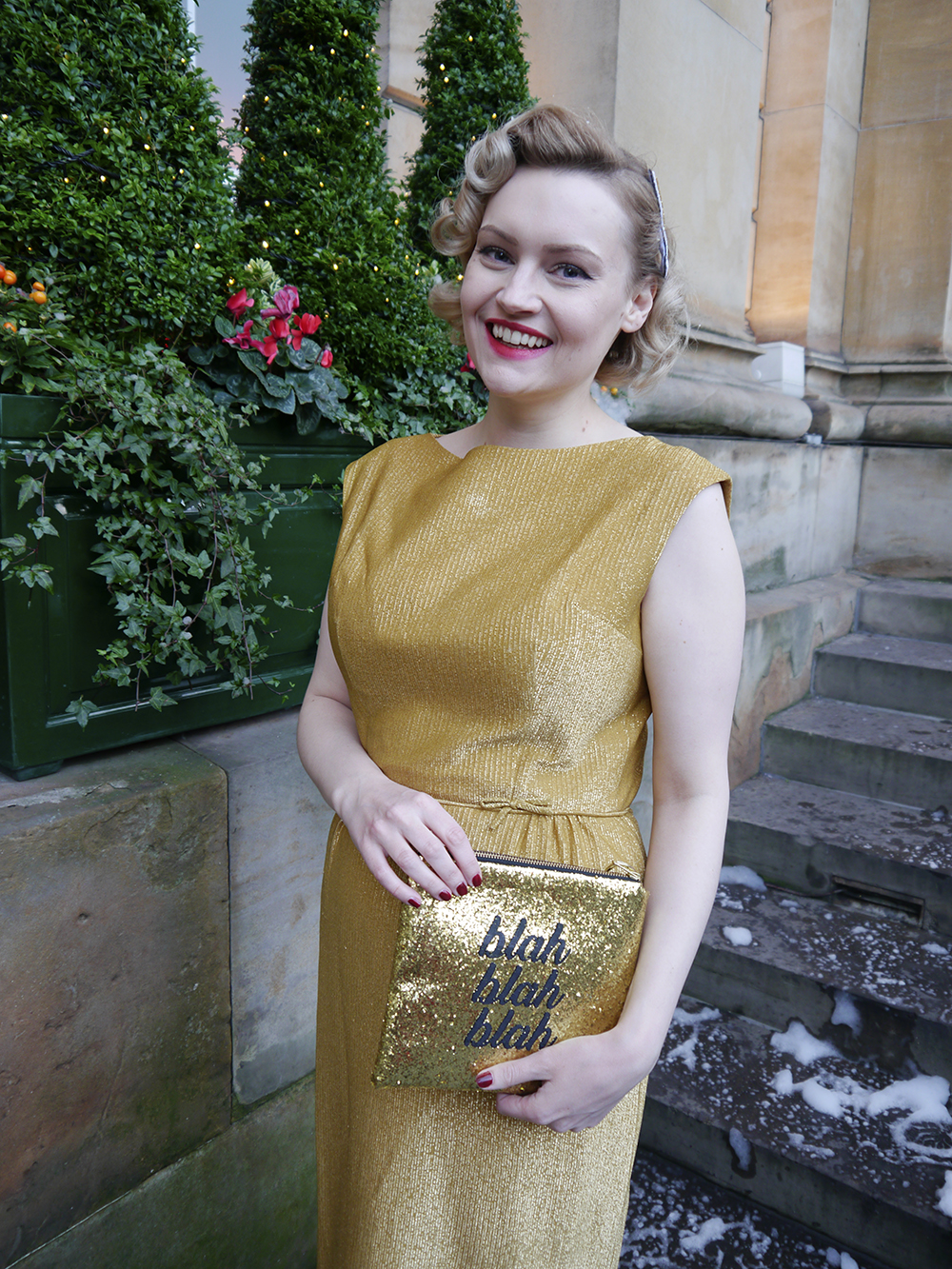 Scottish fashion blogger wardrobe conversations in gold vintage dress British vintage style blogger, faux fur trimmed Henry Holland coat, gold glitter clutch for christmas party, easy vintage pincurl style with tongs, fashion blogger christmas outfit, gold dress from aprils vintage emporium