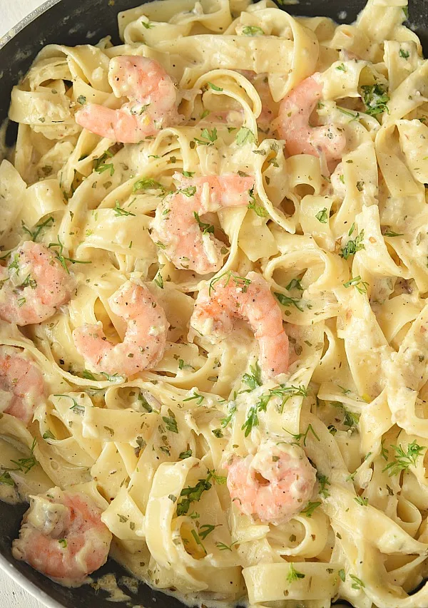 A pan with creamy shrimp fettuccine just like olive garden