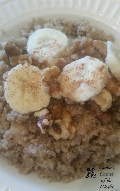 Bowl of cooked quinoa with sliced bananas and walnuts