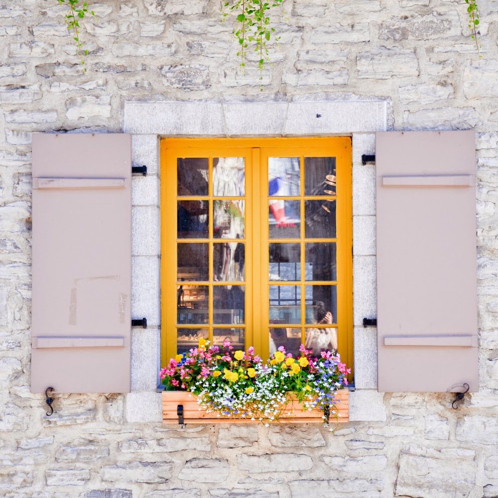 Charming yellow window trim in Quebec city - Travel ideas