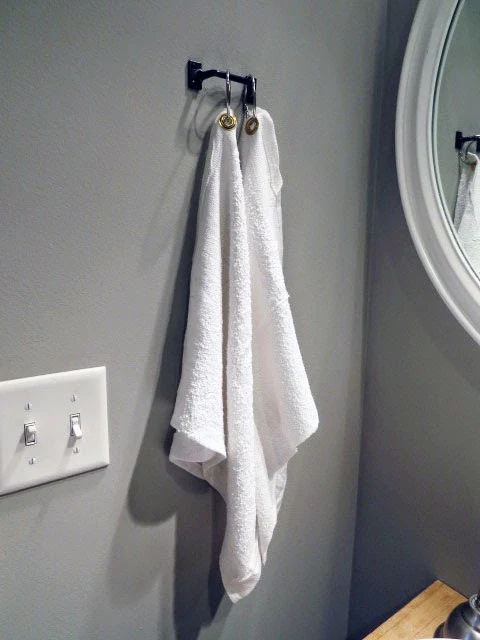 hand towels hanging on drawer pull