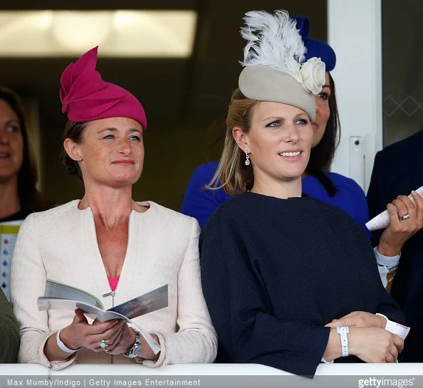 Zara Phillips Style - Dolly Maude and Zara Phillips watch the racing as they attend day 3 'Grand National Day' of the Crabbie's Grand National Festival at Aintree Racecourse