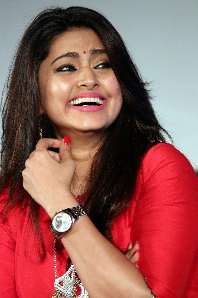 Actress Sneha Smiling Face Close Up In Red Dress