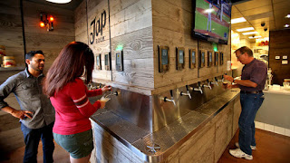 center bar for self service with multiple beer taps