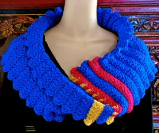 A larger Starlooper Mobius Cowl warms the shoulders