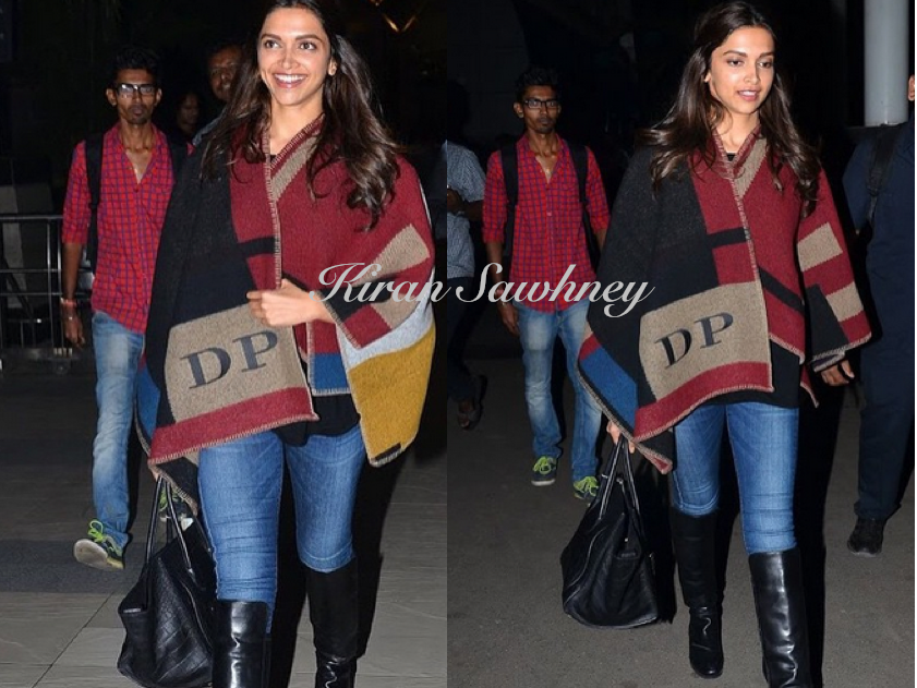 Deepika Padukone with her monogrammed Burberry cape