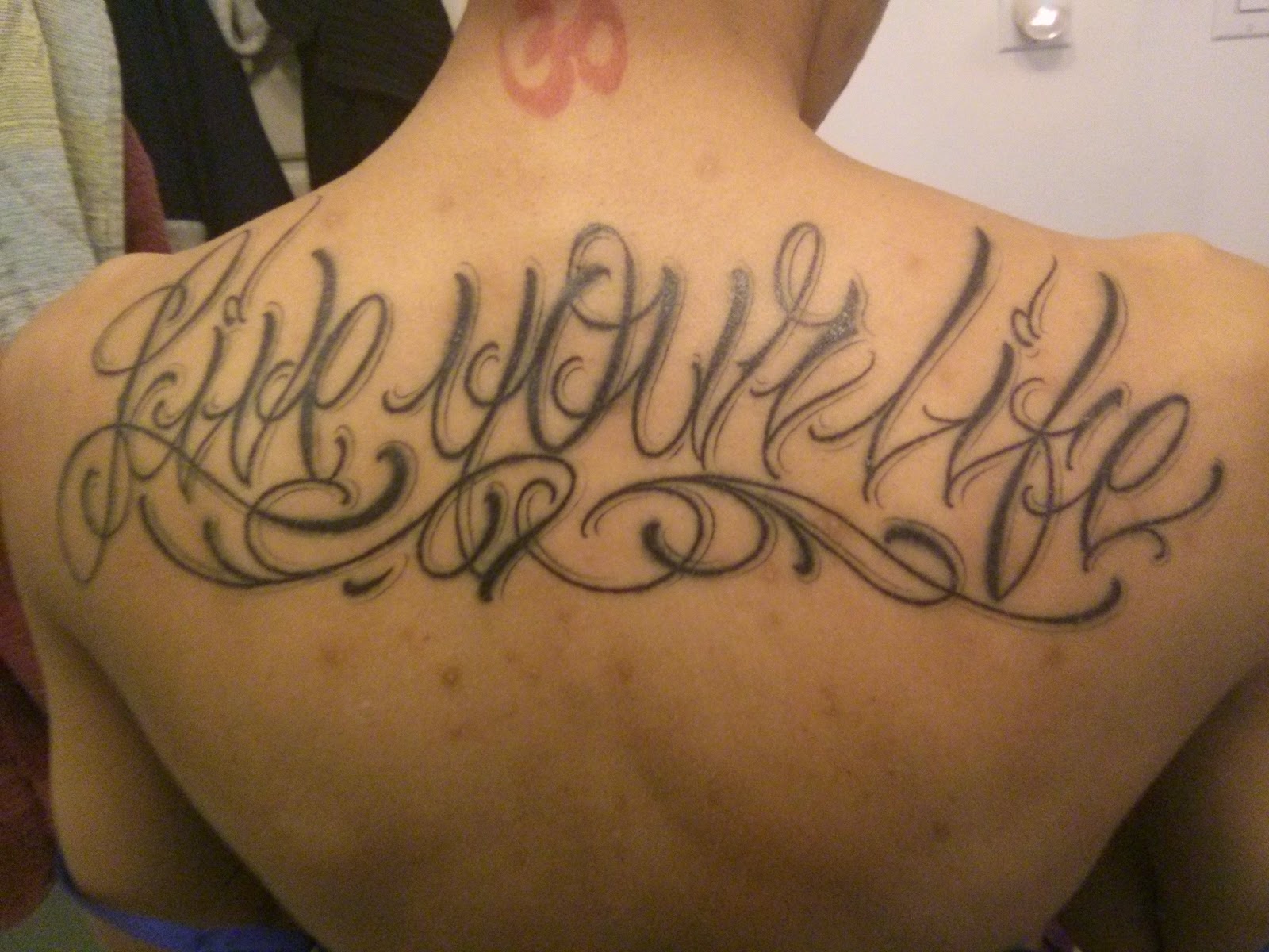 my new ink "live your life" tattoo on back copyright 2014 by OneQuarterMama.ca