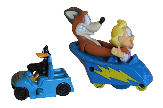 Donald Duck in a plastic windup car, and I have no idea who the fox character is.