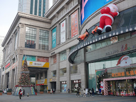 Christmas tree and giant reindeers and Santa Claus at Lihe Plaza in Zhongshan