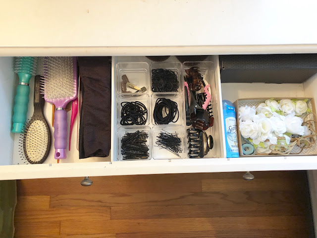 Organized vanity drawer using Container Store bins