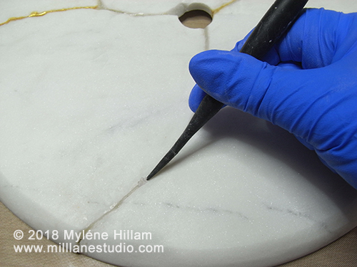 Create a channel in the join by running a pointed sculpting tool through the clay.