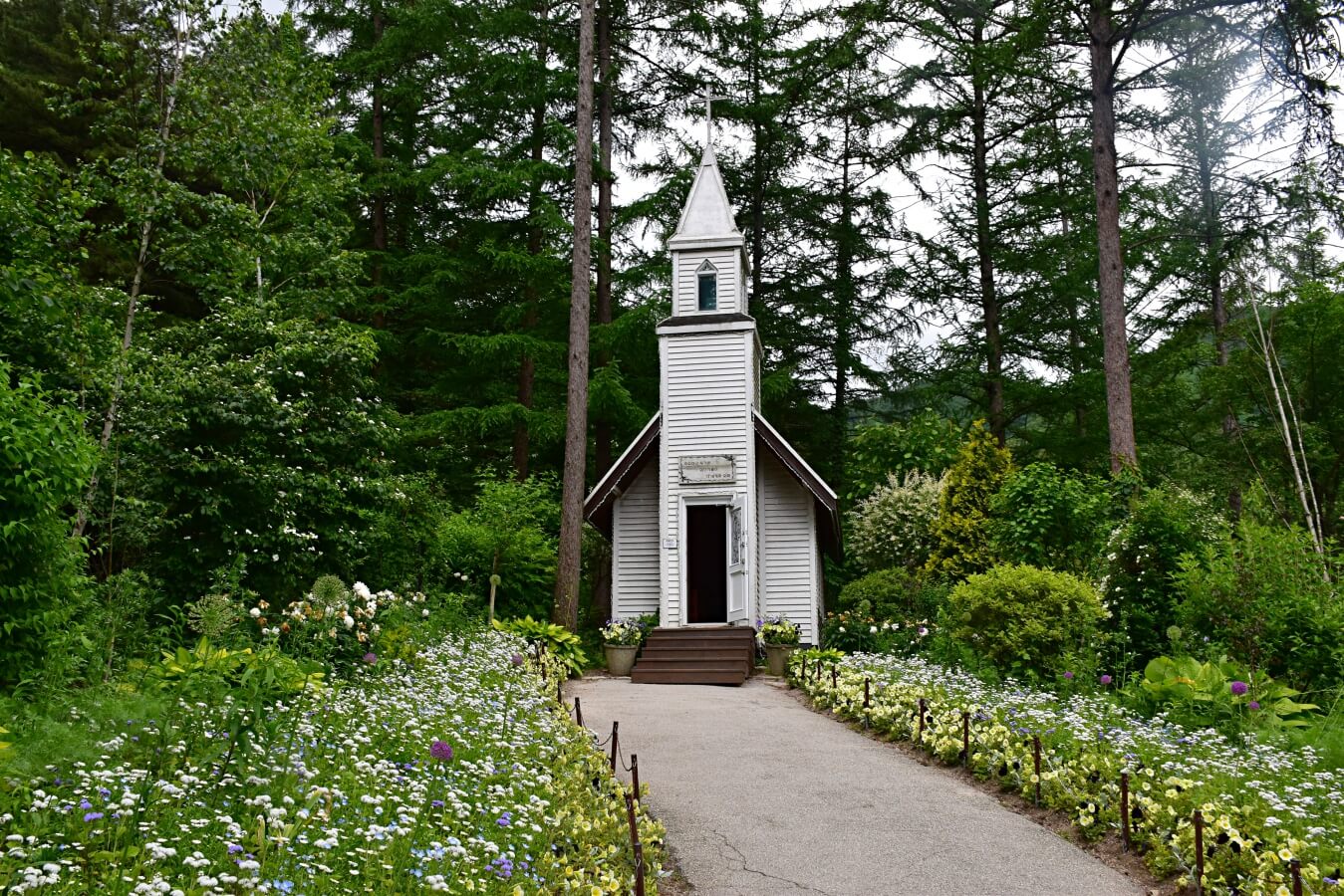 white chapel in garden