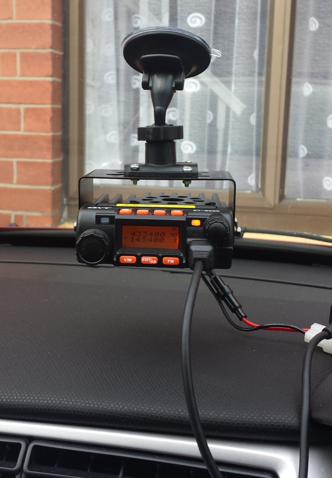 Tony Allen EI4DIB, (Drogheda,Ireland). Windscreen Mount Radio.