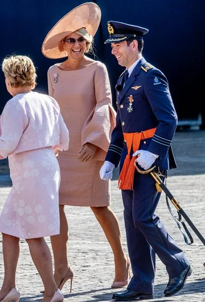Queen Maxima wore NATAN Crepe effect dress with ruffled sleeves. King Willem-Alexander presents Military William Order