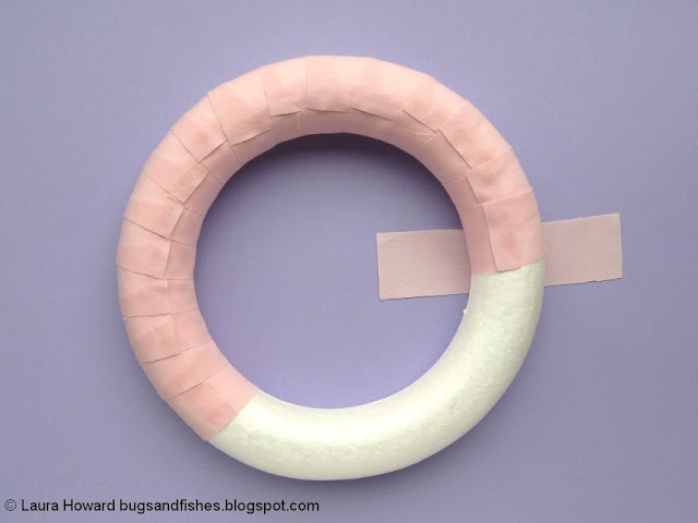 DIY Felt Emoji Ice Cream Summer Wreath Tutorial wrapping the wreath with the fabric