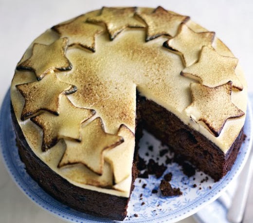 Mincemeat Christmas Cake: A quick Christmas cake made with a mincemeat base that tastes like a rich fruit cake, but which only requires a few days to mature, shown topped with toasted marzipan (almond paste).