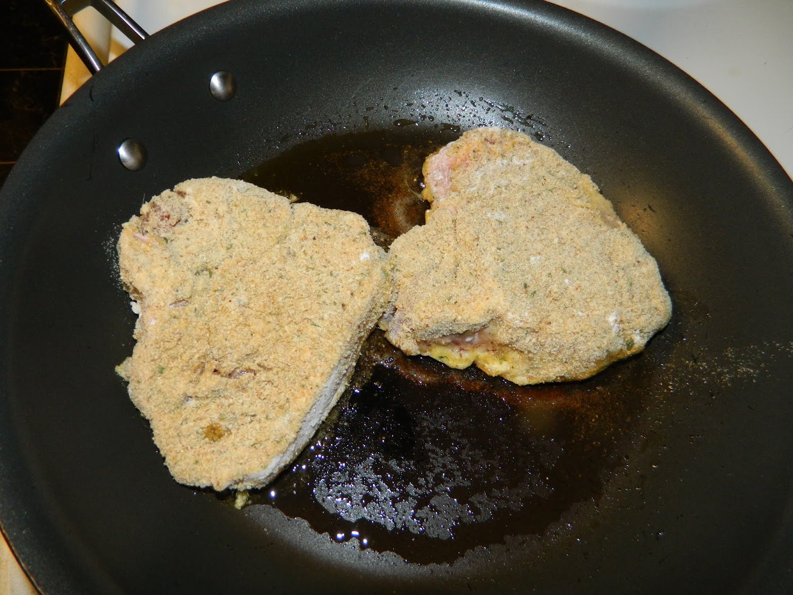 Sugar Ant's kitchen Brined Pork Chops in a Marinara Sauce