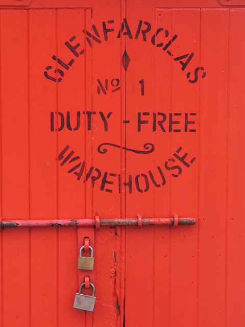 red door of Glenfarclas Distillery warehouse # 1