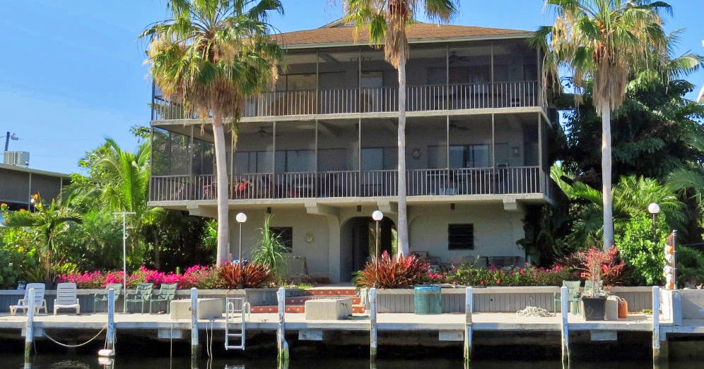 Real Estate in the Florida Keys Canal front Duplex (Both sides!) in Key Largo 975K