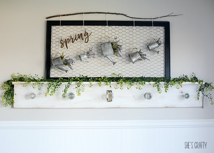 Floral and Greenery Spring Mantel- decorate your home with farmhouse spring charm using faux greenery, faux lavender and a branch from your yard!