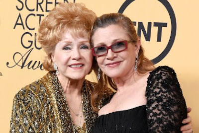 1a Debbie Reynolds dies at age 84, just a day after her daughter, Carrie Fisher dies