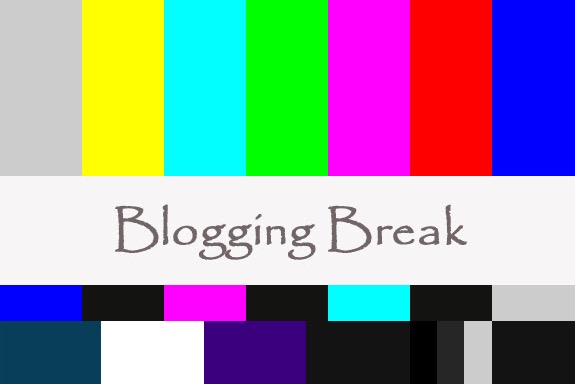 Blogging Break printed over old-style color band TV test pattern