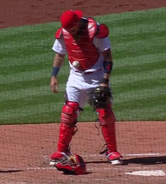 Official Video Yadier Molina got a baseball stuck on his chest