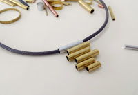 http://www.makery.uk/2015/11/diy-pendant-from-brass-tube-offcuts/