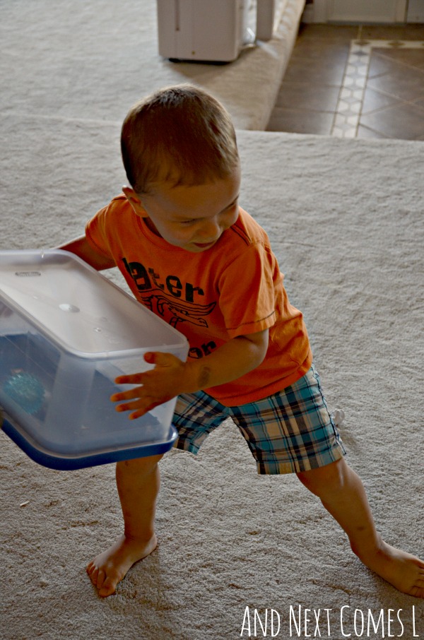Gross motor boredom buster: playing with a glow ball in a box from And Next Comes L