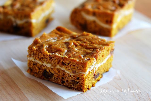 Pumpkin Chocolate Chip Bars are pumpkin heaven, with swirls of cream cheese, and milk chocolate chips. Life-in-the-Lofthouse.com